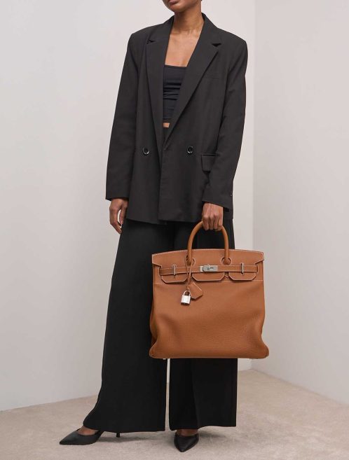 Hermès Haut à Courroies 40 Togo Gold on Model | Sell your designer bag