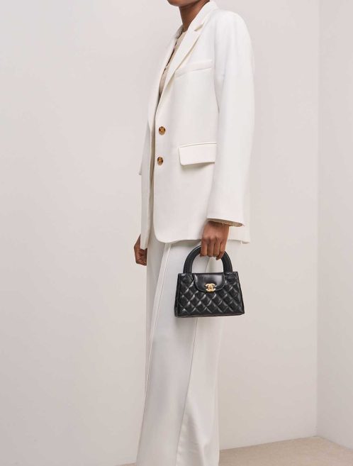 Chanel Kelly Medium Aged Calf Black on Model | Sell your designer bag