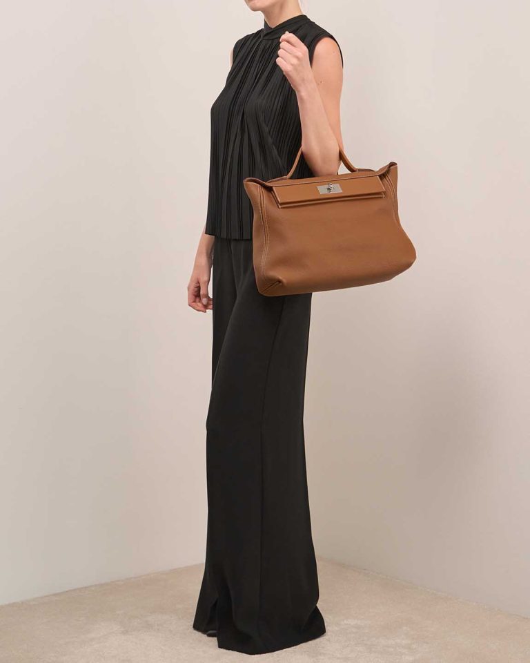 Hermès 24/24 35 Taurillon Clémence / Swift Gold Front | Sell your designer bag