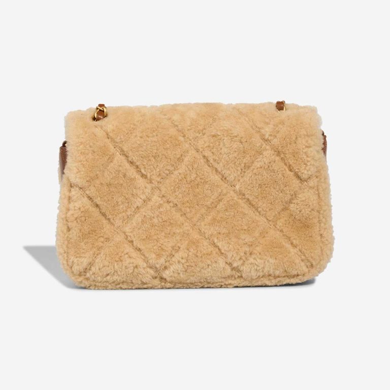 Chanel Timeless Handle Medium Lamb / Shearling Cognac / Beige | Sell your designer bag