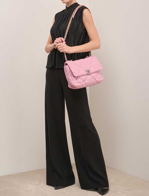 Chanel 19 Large Flap Bag Lamb Pink on Model | Sell your designer bag