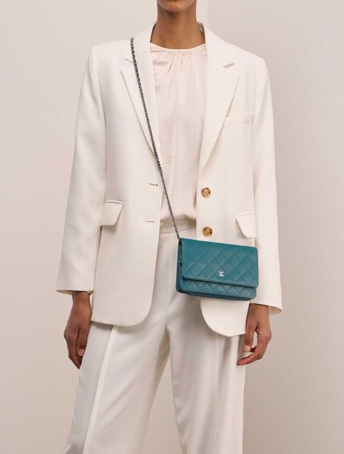 Chanel Timeless Wallet On Chain Lamb Petrol Blue on Model | Sell your designer bag