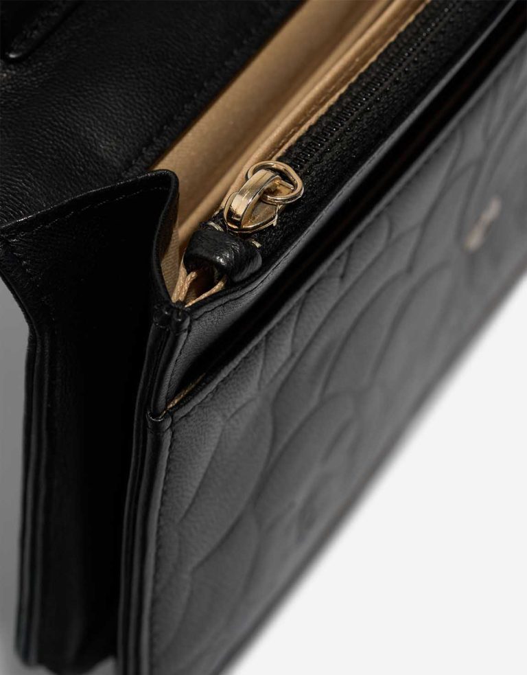 Chanel Timeless Wallet On Chain Lamb Black Signs of wear | Sell your designer bag