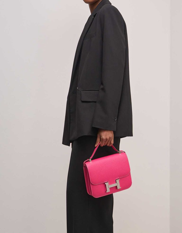Hermès Constance 24 Epsom Rose Tyrien on Model | Sell your designer bag