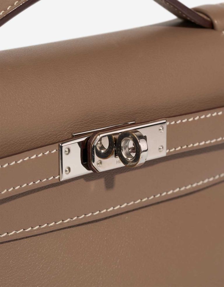 Hermès Kelly Pochette Swift Étoupe Closing System | Sell your designer bag