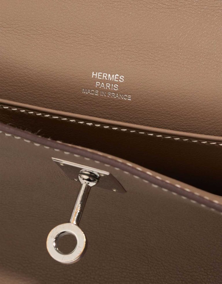 Hermès Kelly Pochette Swift Étoupe Logo | Sell your designer bag