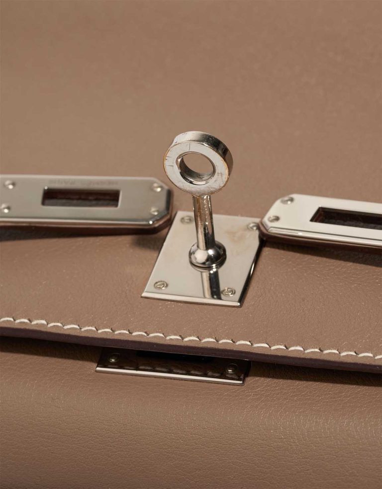 Hermès Kelly Pochette Swift Étoupe Signs of wear | Sell your designer bag