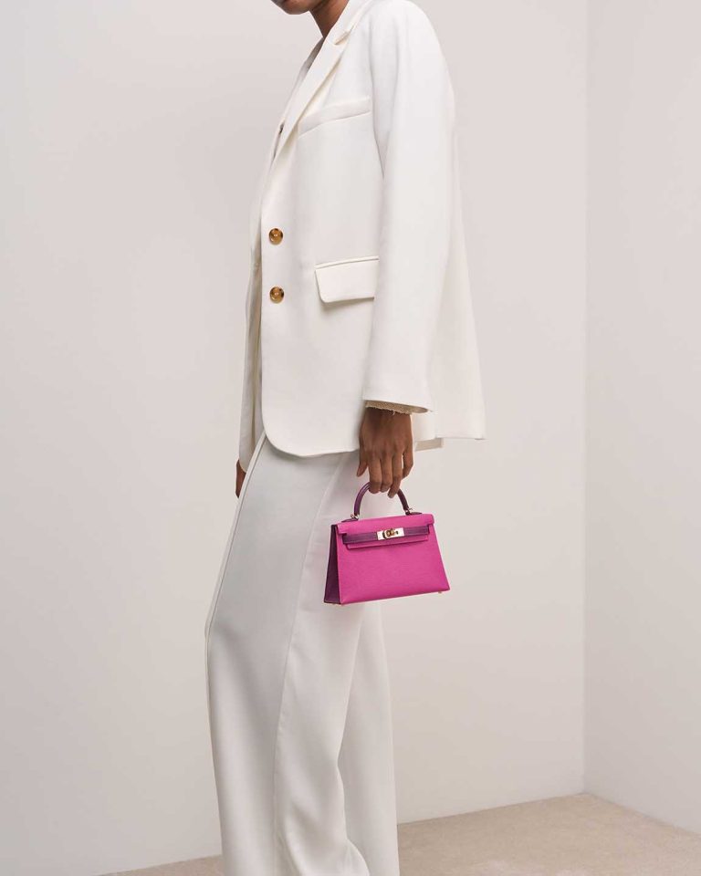 Hermès Kelly HSS Mini Chèvre Mysore Magnolia / Ultraviolet on Model | Sell your designer bag