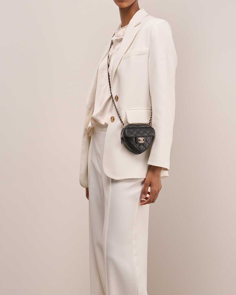 Chanel Timeless Heart Small Lamb Black on Model | Sell your designer bag