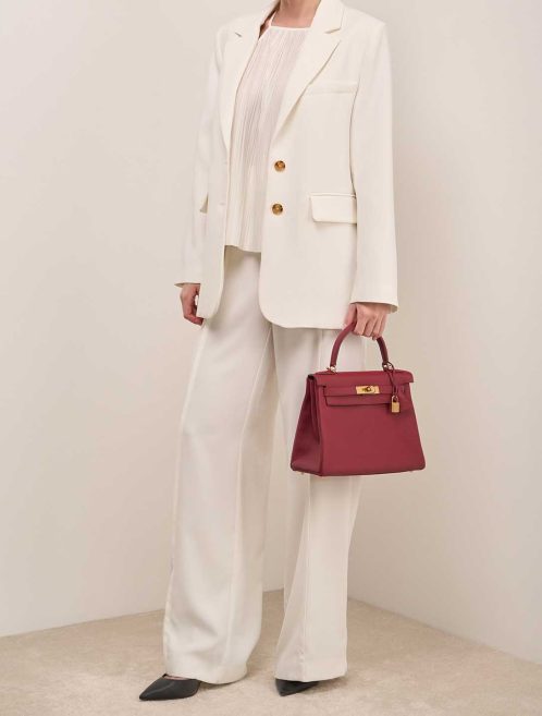Hermès Kelly 28 Togo Rubis on Model | Sell your designer bag