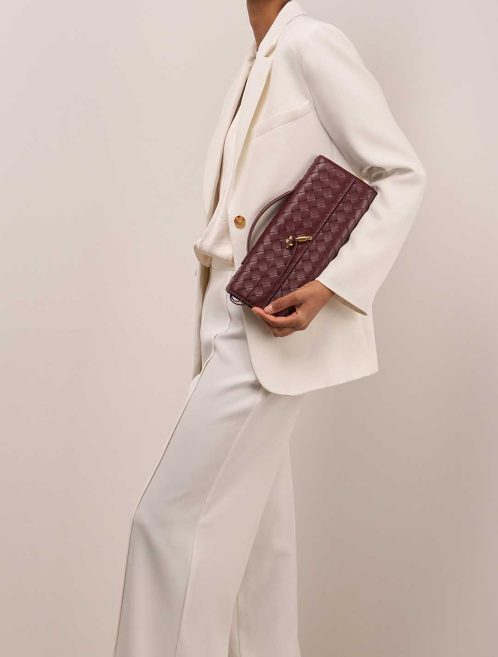 Bottega Veneta Andiamo Clutch Lamb Burgundy on Model | Sell your designer bag