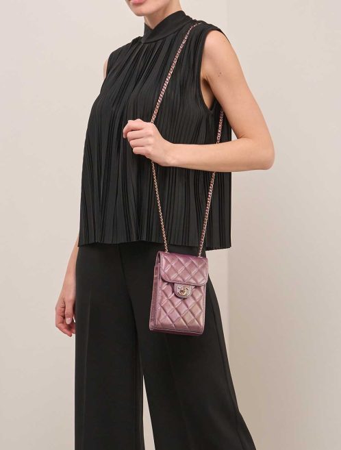 Chanel Timeless Phone Holder Lamb Metallic Rose Gold on Model | Sell your designer bag