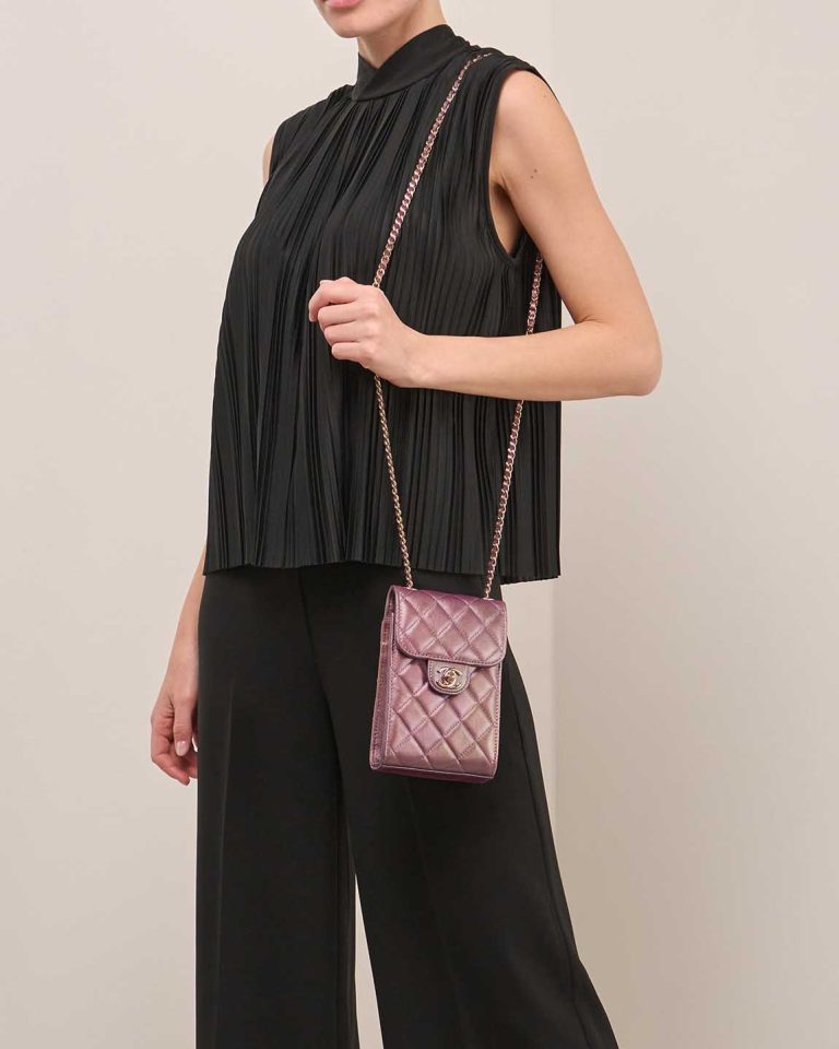 Chanel Timeless Phone Holder Lamb Metallic Rose Gold on Model | Sell your designer bag