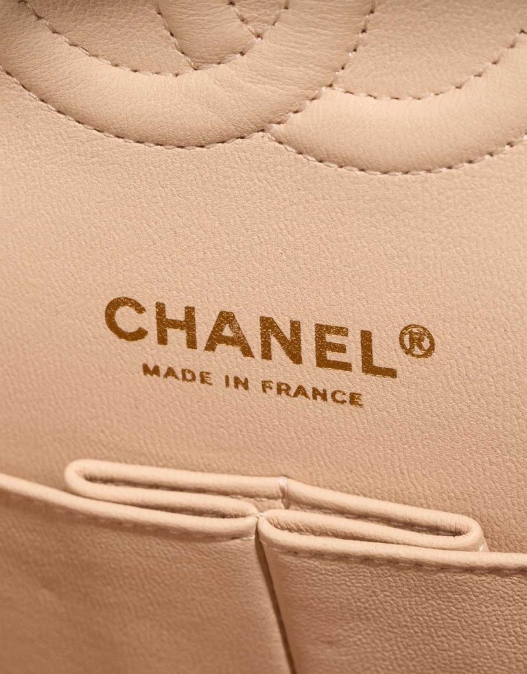 Chanel Timeless Chevron Medium Caviar Beige Logo | Sell your designer bag