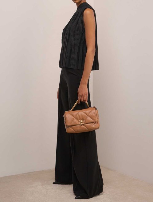 Chanel 19 Flap Bag Lamb Brown on Model | Sell your designer bag