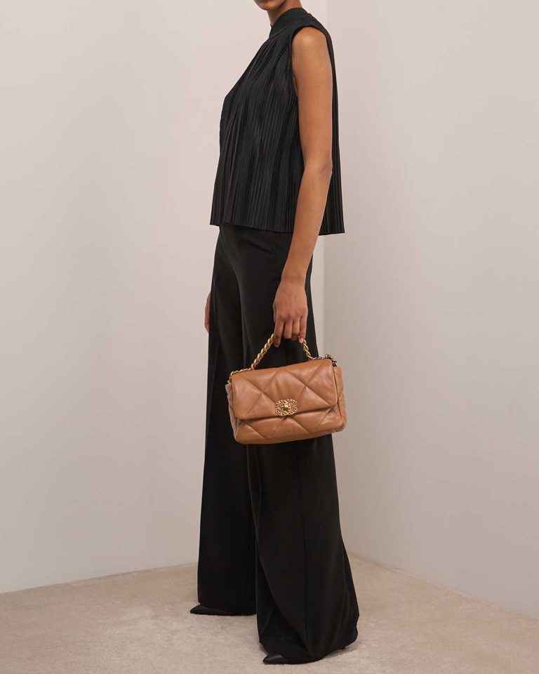 Chanel 19 Flap Bag Lamb Brown on Model | Sell your designer bag