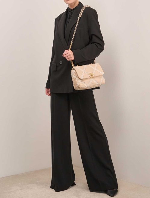 Chanel 19 Flap Bag Calf Beige on Model | Sell your designer bag