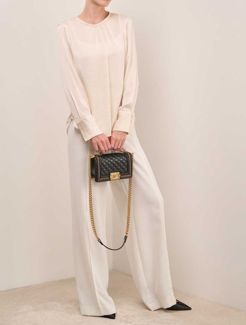 Chanel Boy Top Handle Small Lamb Black on Model | Sell your designer bag