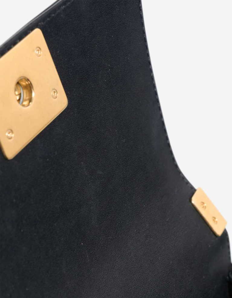 Chanel Boy Top Handle Small Lamb Black Signs of wear | Sell your designer bag