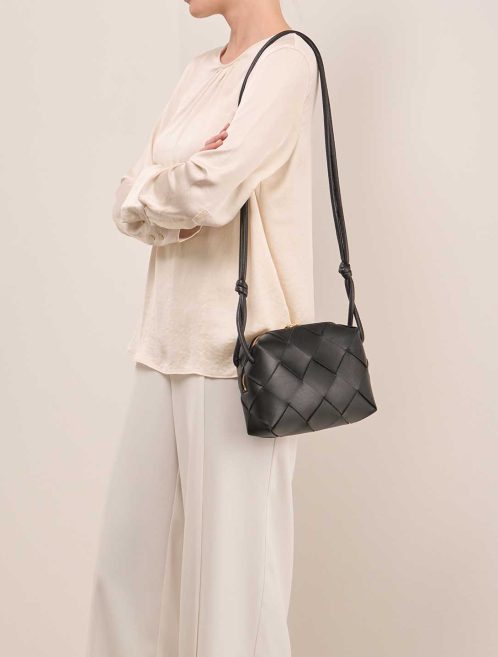 Bottega Veneta Cassette Camera Bag Small Calf Black on Model | Sell your designer bag