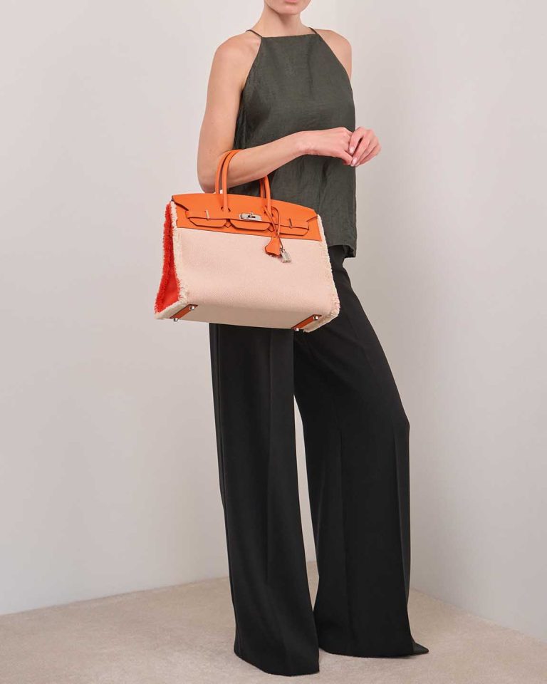 Hermès Birkin Fray 35 Swift / Toile Écru / Orange Poppy on Model | Sell your designer bag