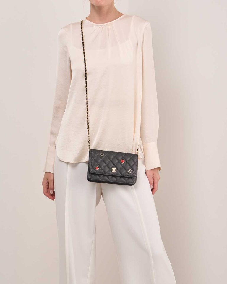 Chanel Timeless Wallet On Chain Caviar Black on Model | Sell your designer bag