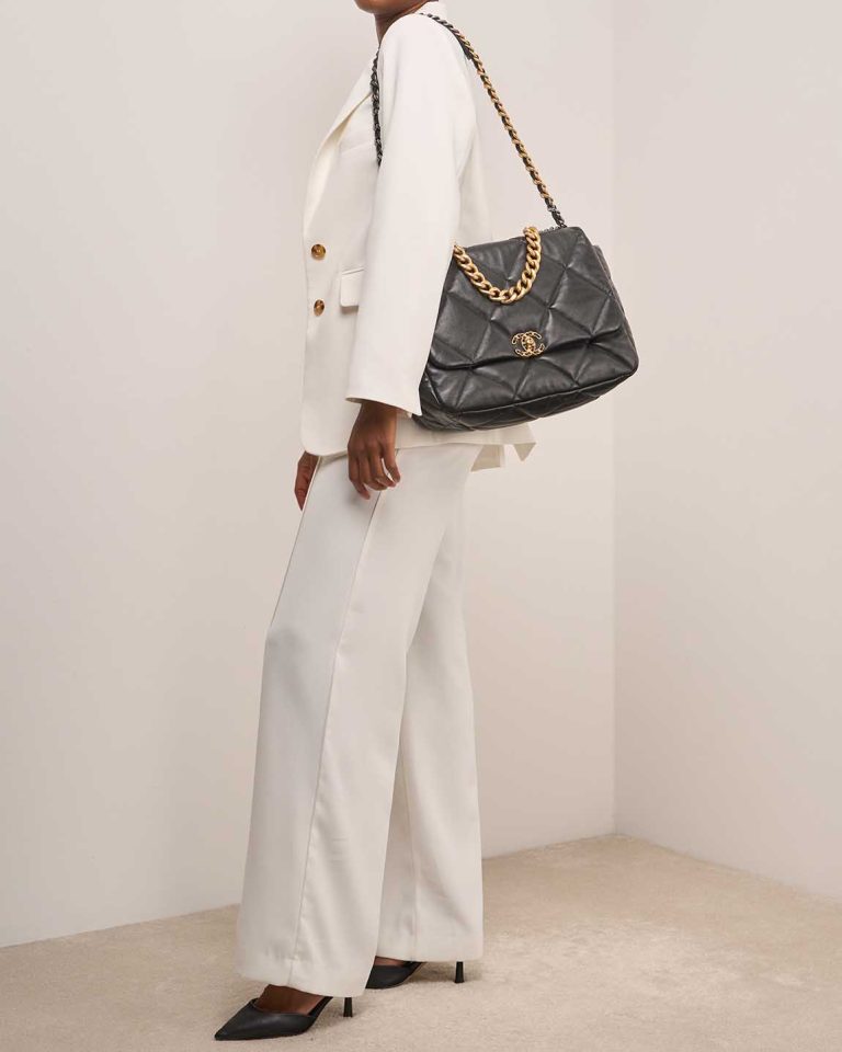 Chanel 19 Large Flap Bag Lamb Black on Model | Sell your designer bag
