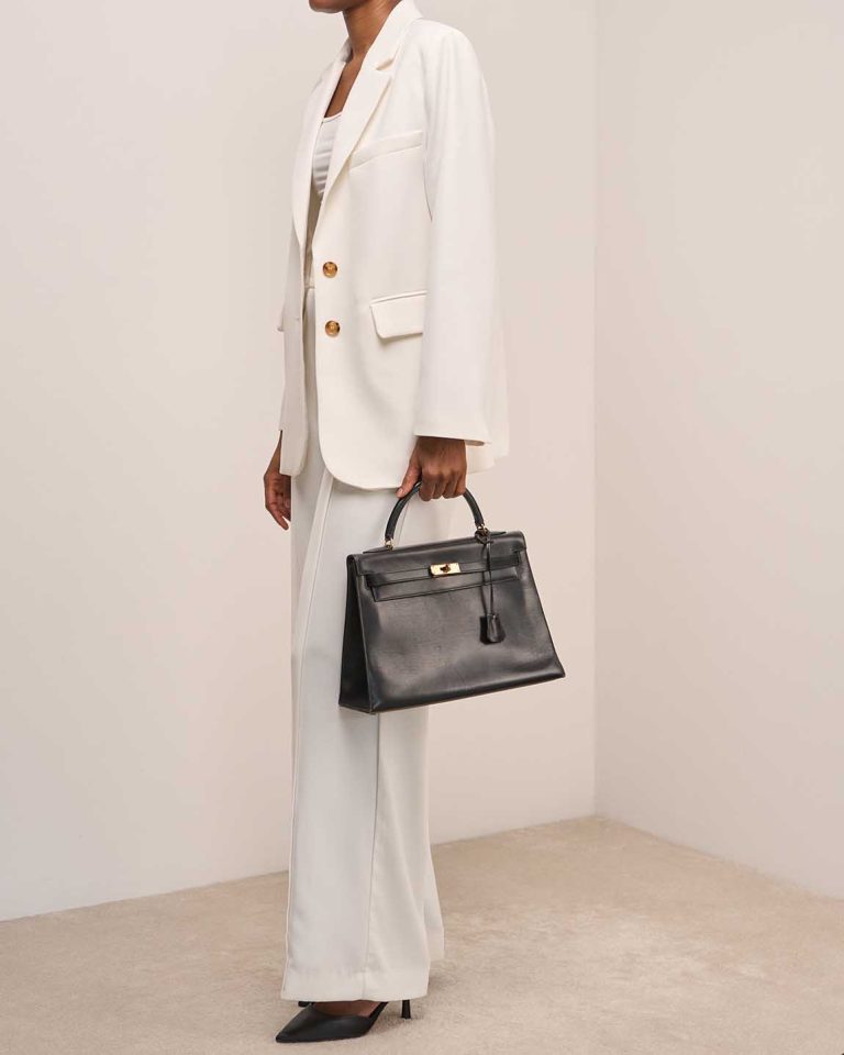 Hermès Kelly 32 Box Black on Model | Sell your designer bag