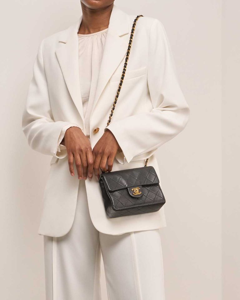 Chanel Timeless Mini Square Lamb Black on Model | Sell your designer bag