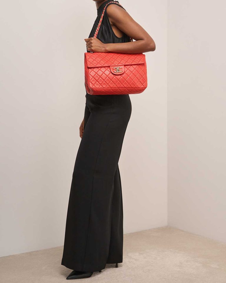Chanel Timeless Jumbo Lamb Red on Model | Sell your designer bag