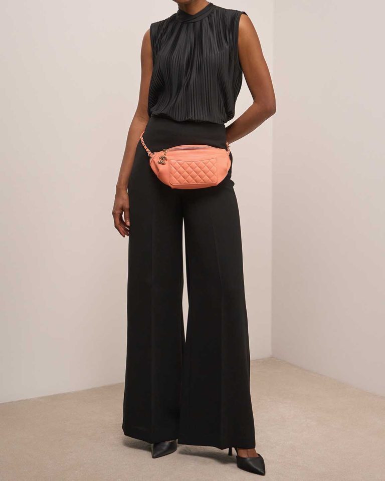Chanel Timeless Belt Bag Medium Lamb Coral on Model | Sell your designer bag