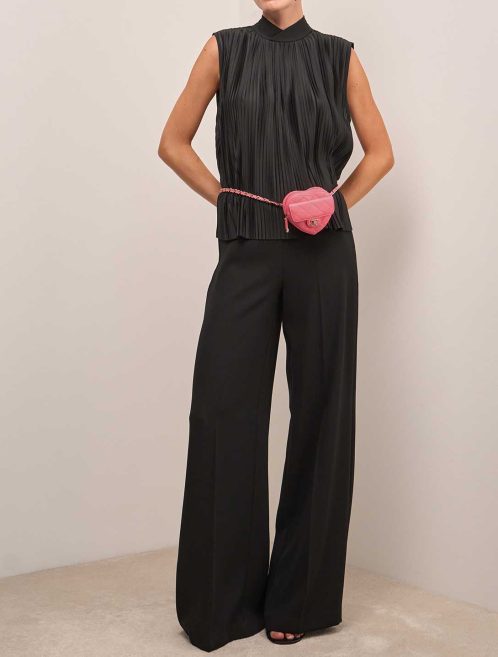 Chanel Timeless Heart Belt Bag Lamb Pink on Model | Sell your designer bag
