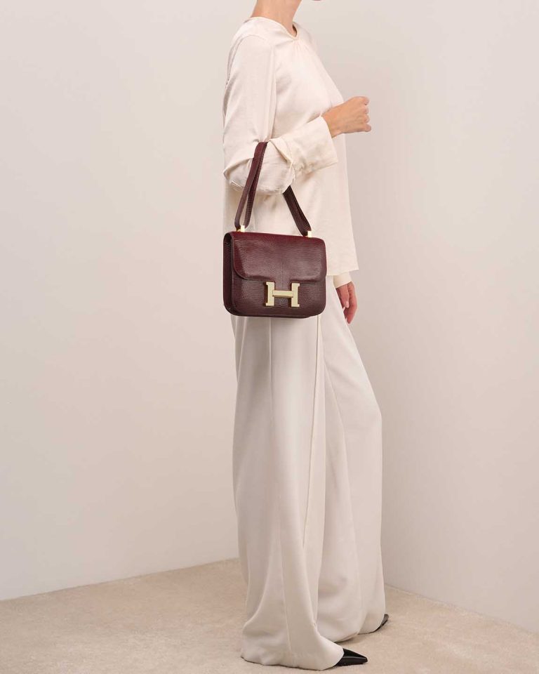 Hermès Constance 23 Lizard Bordeaux on Model | Sell your designer bag