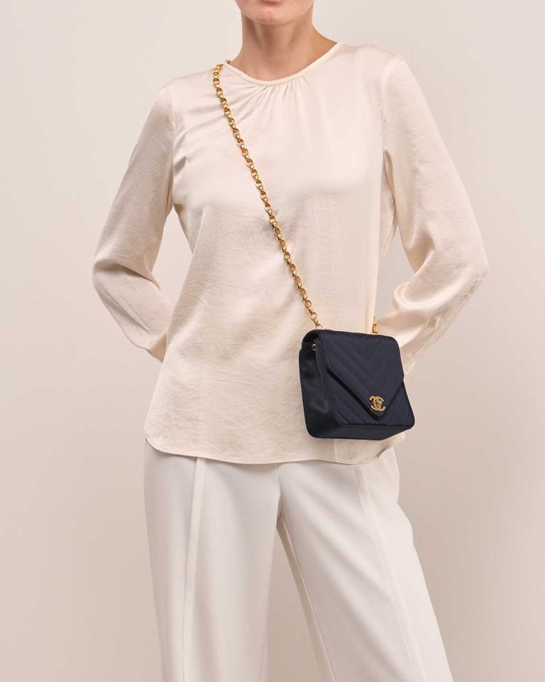 Chanel Timeless Chevron Mini Square Silk Dark Blue on Model | Sell your designer bag