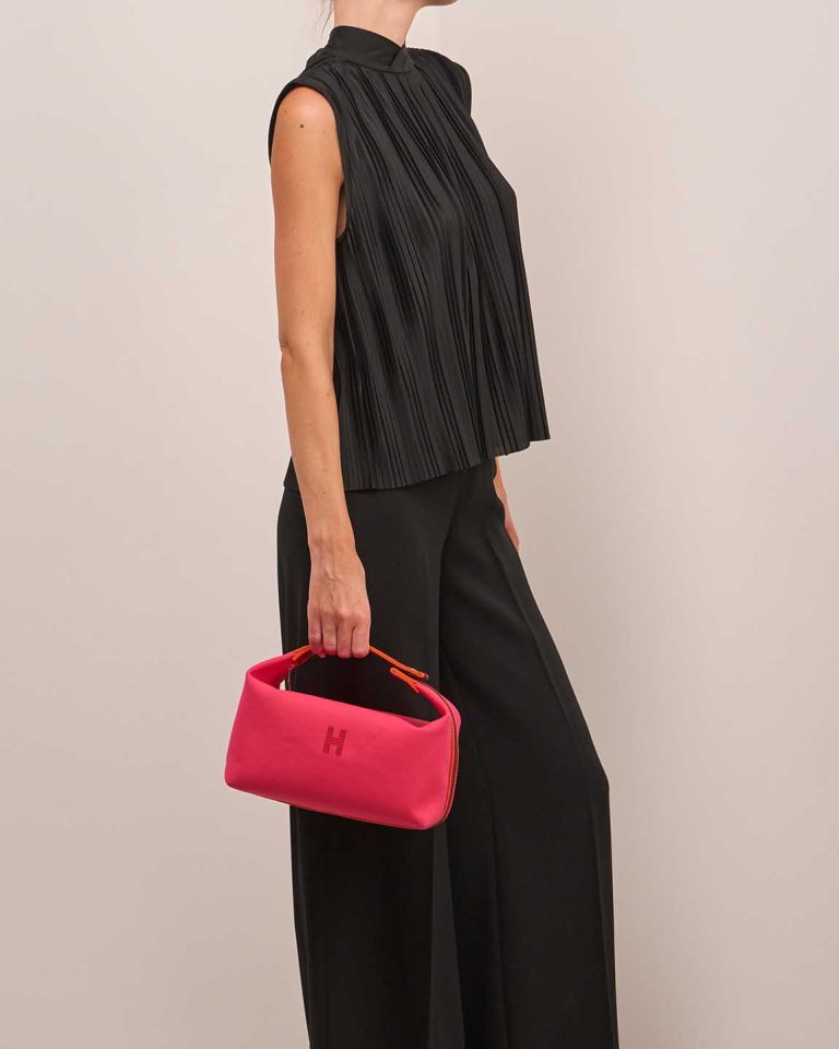 Hermès Bride-à-Brac Set Wool Rose Extrême / Orange H / Rouge H on Model | Sell your designer bag