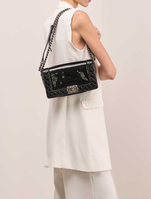 Chanel Boy Medium Patent Black on Model | Sell your designer bag