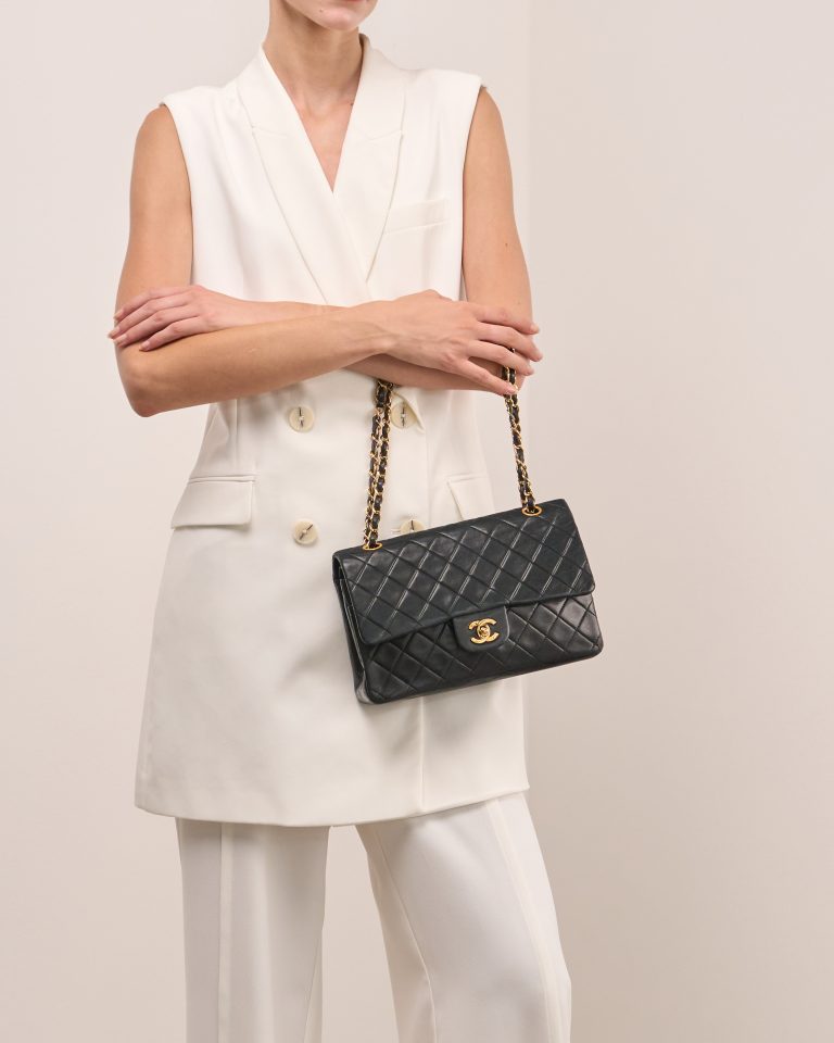 Chanel Timeless Medium Lamb Black on Model | Sell your designer bag