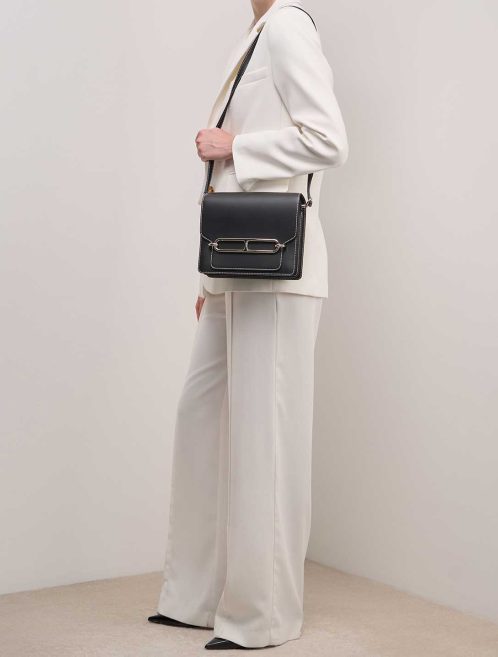 Hermès Roulis 23 Veau Sombrero Black on Model | Sell your designer bag