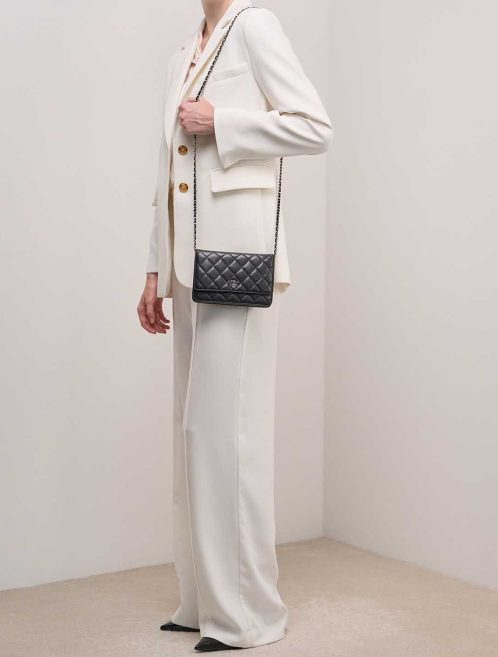 Chanel Timeless Wallet On Chain Lamb Black on Model | Sell your designer bag