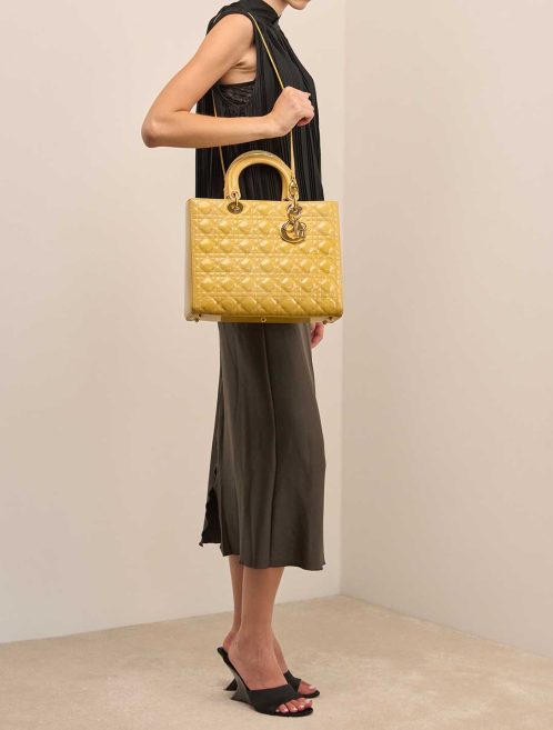 Dior Lady Large Patent Mustard on Model | Sell your designer bag