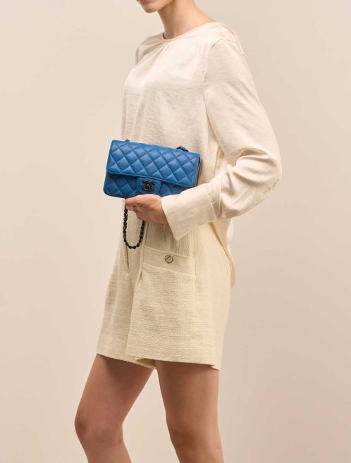 Chanel Timeless Mini Rectangular Lamb Blue on Model | Sell your designer bag