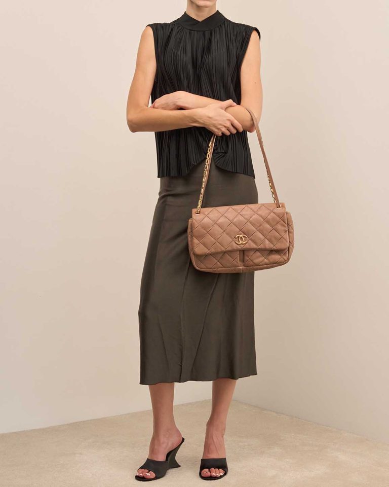 Chanel Timeless Jumbo Calf Beige on Model | Sell your designer bag