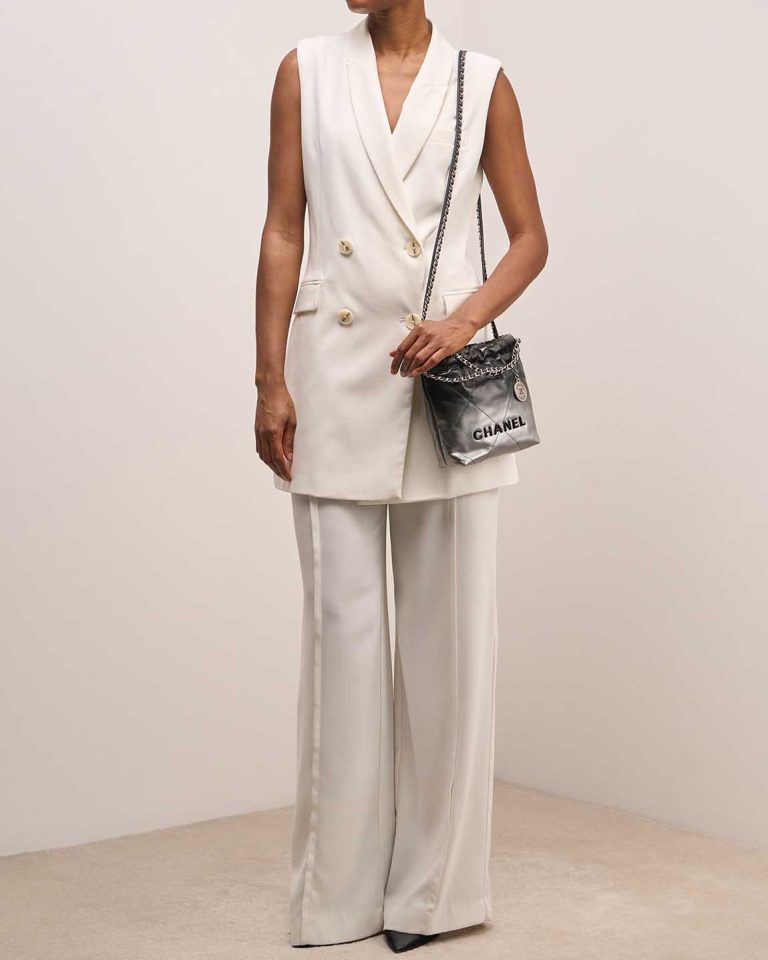 Chanel 22 Mini Lamb Black on Model | Sell your designer bag