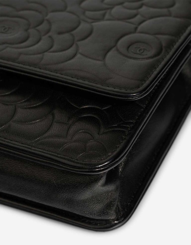 Chanel Wallet On Chain Camellia Lamb Black Signs of wear | Sell your designer bag