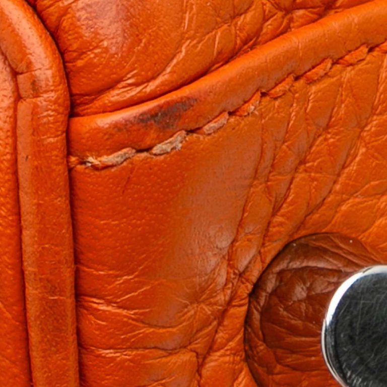 Hermès Kelly 35 Togo Orange Signs of wear | Sell your designer bag