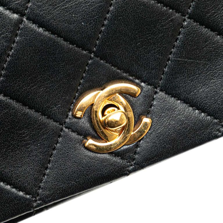 Chanel Flap Bag Mini Lamb Black Closing System | Sell your designer bag