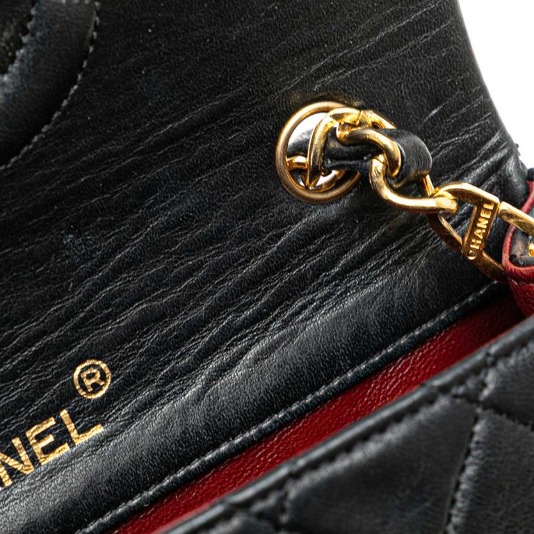 Chanel Flap Bag Mini Lamb Black Signs of wear | Sell your designer bag