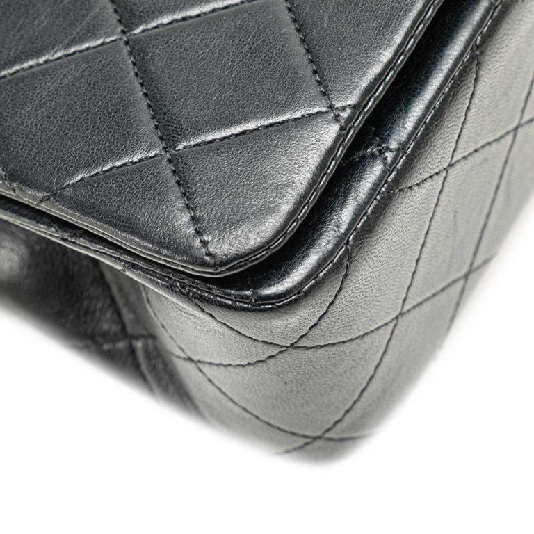 Chanel Flap Bag Mini Lamb Black Signs of wear | Sell your designer bag