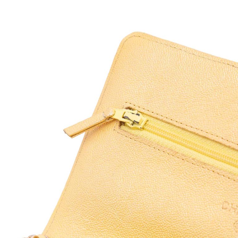 Chanel Timeless Wallet Caviar Yellow Signs of wear | Sell your designer bag