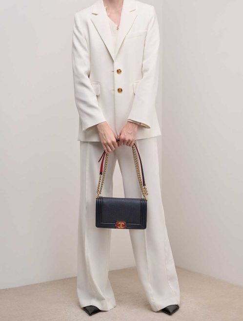Chanel Boy Old Medium Lamb Dark Blue on Model | Sell your designer bag
